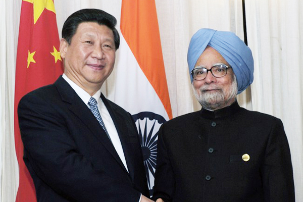 President Xi Jinping and Prime Minister Manmohan Singh, March 27. PIB/AFP