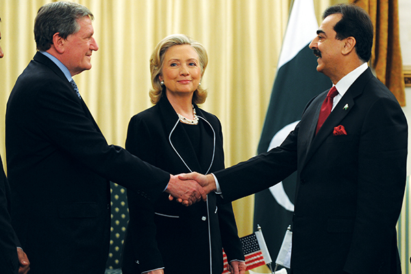 Holbrooke, Clinton, and Gilani, July 18, 2010. Aamir Qureshi—AFP