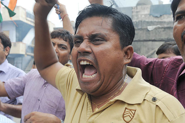 A demonstrator shouts anti-Pakistan slogans at a rally in India. Sam Panthanky—AFP