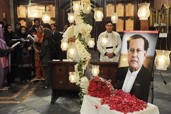 Praying for Taseer at a church in Lahore, Jan. 9, 2011. Arif Ali—AFP