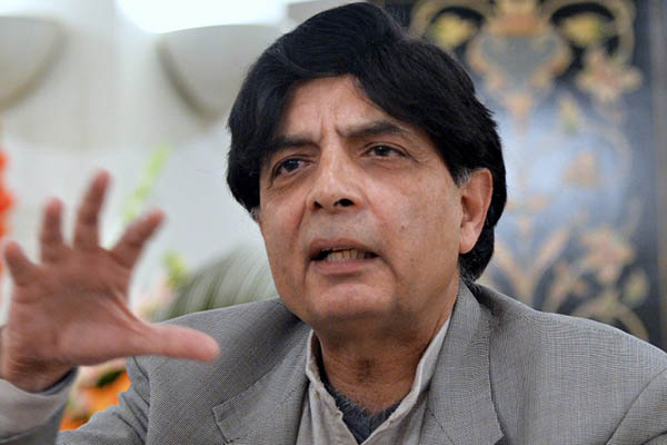 Interior Minister Chaudhry Nisar Ali Khan announces the suspension of peace talks, February 2014. Aamir Qureshi—AFP