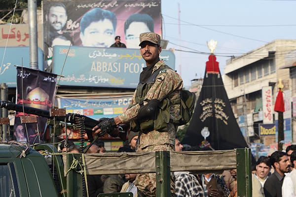 A Pakistan Army vehicle patrols Rawalpindi. Farooq Naeem—AFP