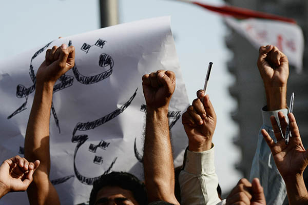 Protesting journalists after the gun attack on Hamid Mir. Asif Hussain—AFP