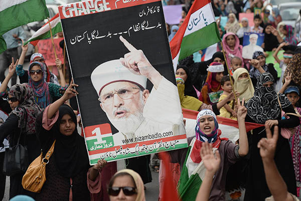 Supporters of Tahir-ul-Qadri protest the police brutality that led to the killing of eight people. Asif Hassan—AFP