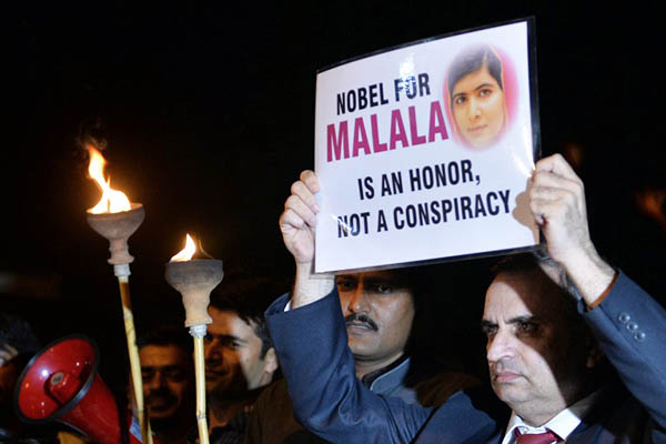 Supporters of Malala Yousafzai celebrate her award by dismissing claims of ‘conspiracy.’ Aamir Qureshi—AFP