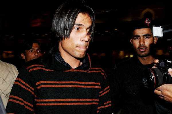Mohammad Aamer's ban will expire in August 2015. Arif Ali—AFP