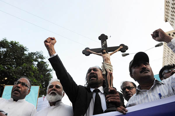 Protesters in Karachi demand justice for Shehzad Masih and Shama Bibi. Asif Hassan—AFP