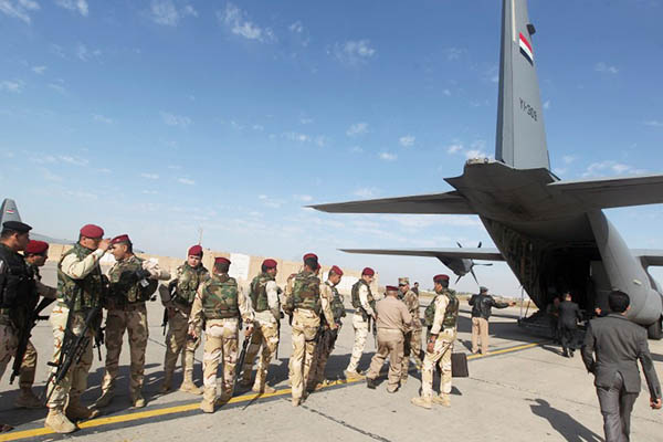 Iraqi soldiers prepare to fly to Baghdad for training on fighting the Islamic State. Ahmad al-Rubaye—AFP