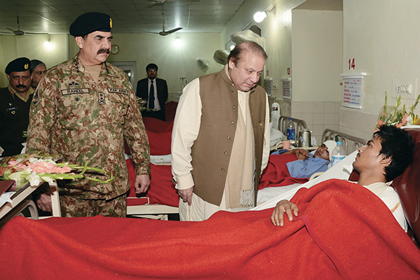 With Prime Minister Sharif in Peshawar, Dec. 17. ISPR/AFP