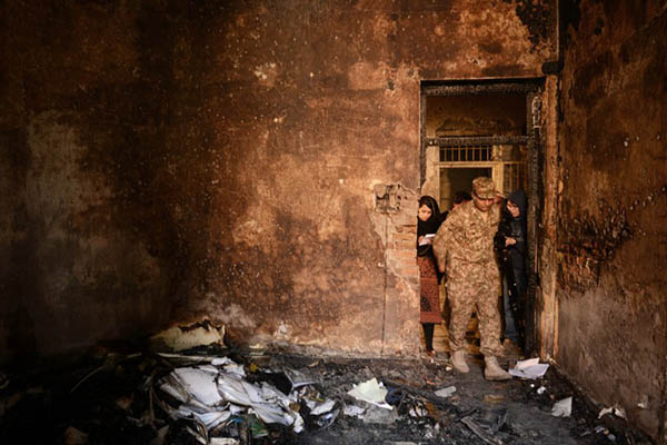 A burnt classroom within the Army Public School. A. Majeed—AFP