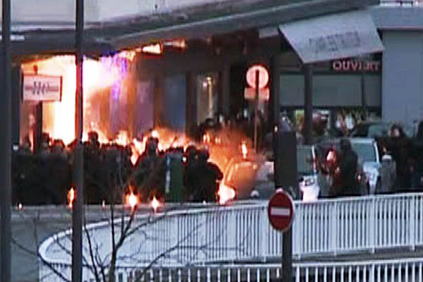 A screengrab shows French police launching an assault on a kosher grocery store occupied by an assailant on Jan. 9. Gabrielle Chatelain-AFPTV—AFP