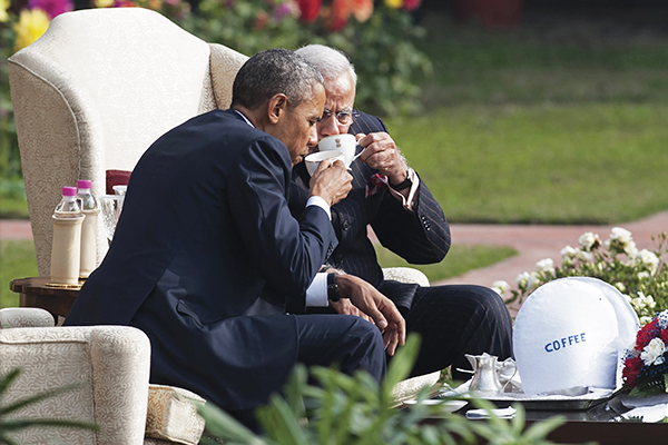 Obama and Modi enjoying a cuppa, Jan. 25, New Delhi. Saul Loeb—AFP