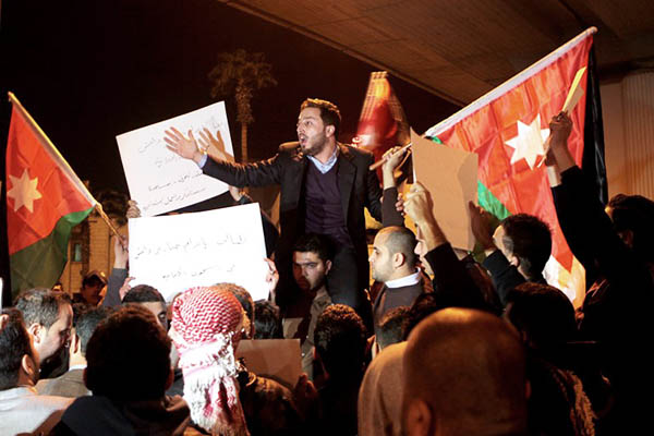 Jordanians in Amman protest Kaseasbeh’s killing. AFP