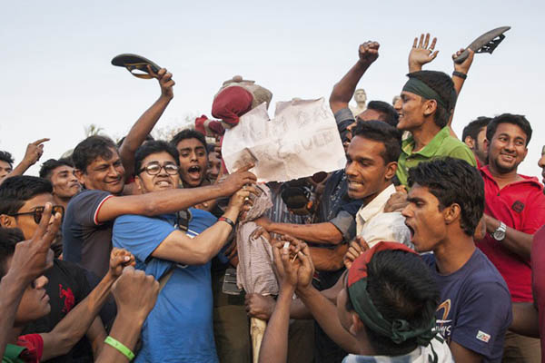 Bangladeshi fans protest against the umpire of Aleem Dar. Rajib Dhar—AFP