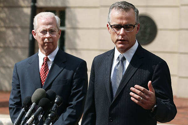Andrew G. McCabe (right), assistant director of the FBI’s Washington Field Office speaks after Amin’s hearing. Mark Wilson-Getty Images North America—AFP