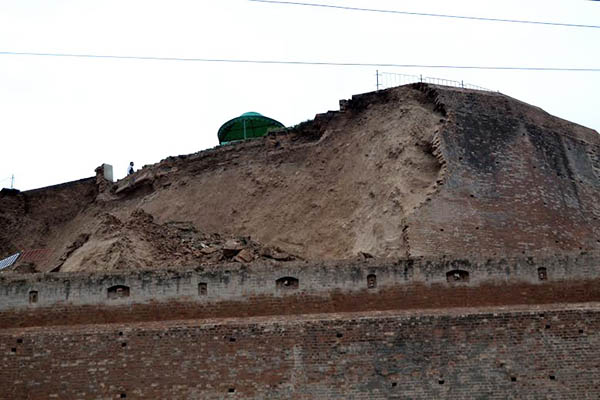 One wall of the historic Bala Hissar Fort lies in ruins after the earthquake.