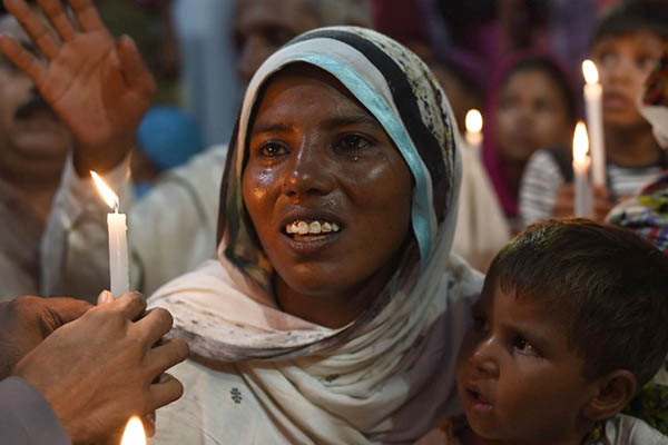 Shama Bibi’s sister attends a protest against the mob lynching of her relatives. Arif Ali—AFP