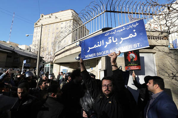 An Iranian protester outside the Saudi embassy in Tehran. Atta Kenare—AFP