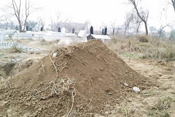 The unmarked grave of the Charsadda attackers.