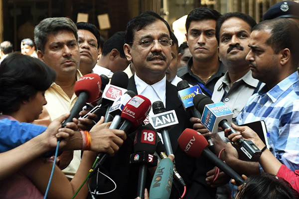 Indian public prosecutor Ujjwal Nikam speaks to media outside the sessions court in Mumbai. Punit Paranjpe—AFP
