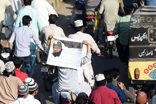 Pro-Qadri protesters rally in Karachi on Feb. 29. Asif Hassan—AFP