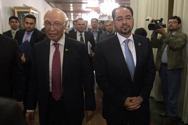 National security adviser Sartaj Aziz, left, with Afghan foreign minister Salahuddin Rabbani. Aamir Qureshi—AFP