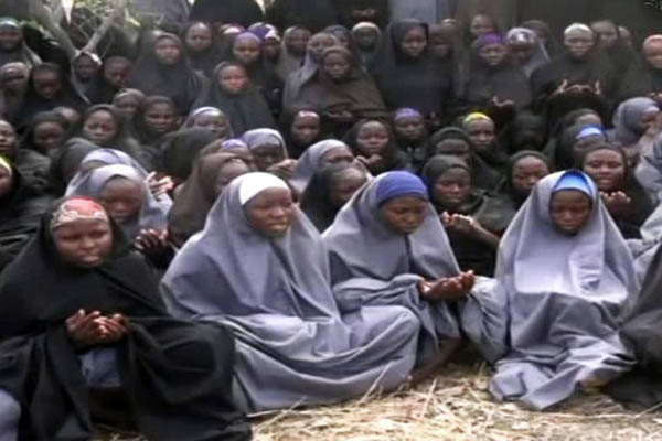 A screengrab of the missing girls from a video sent by Boko Haram militants. AFP