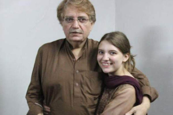 Activist Idris Khattak with one of his daughters
